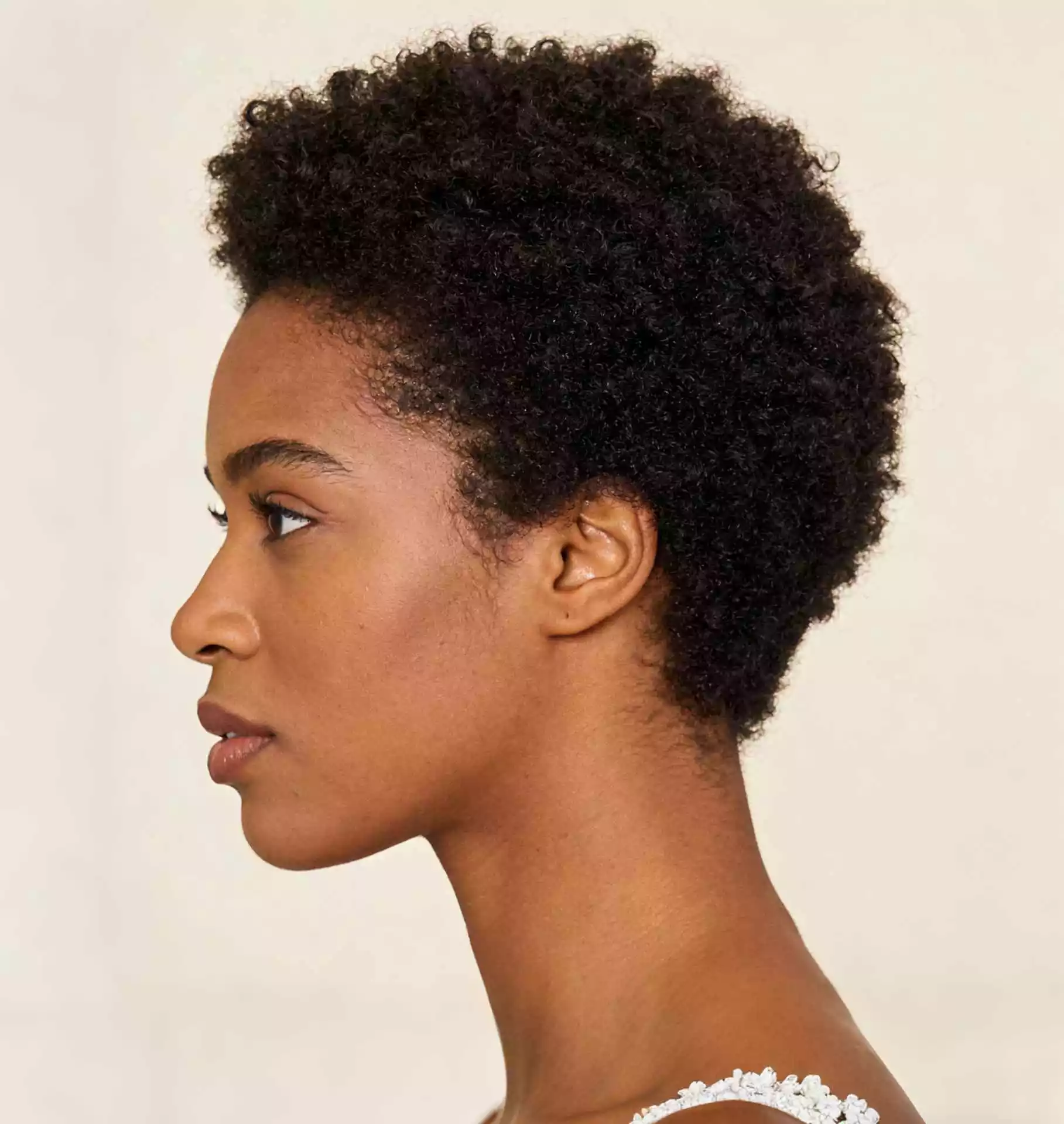 fluffy cropped wash-and-go short natural hairstyle for black women with soft texture and airy compact volume