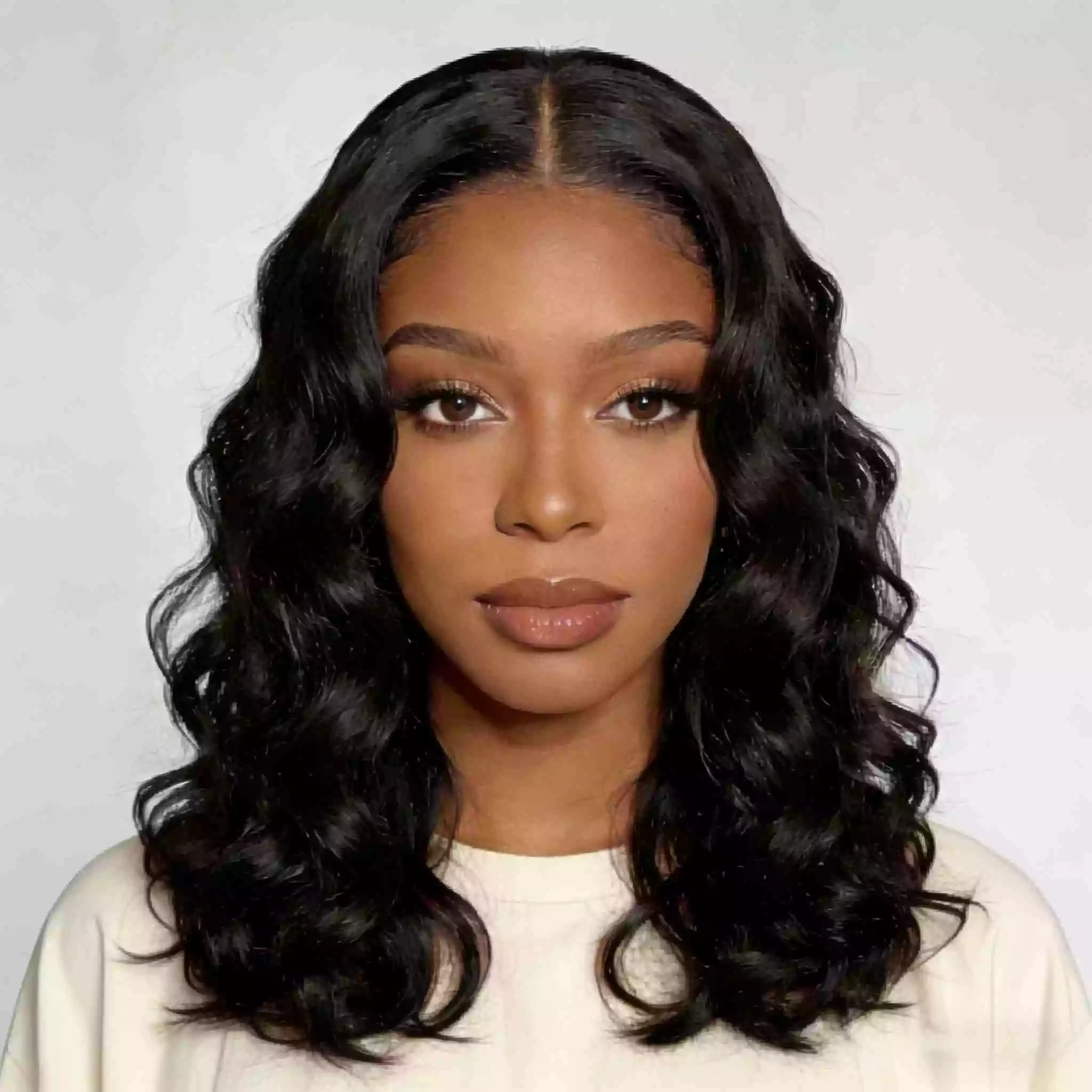 middle-part loose curl quick weave for black women with soft curls, center part, and balanced volume