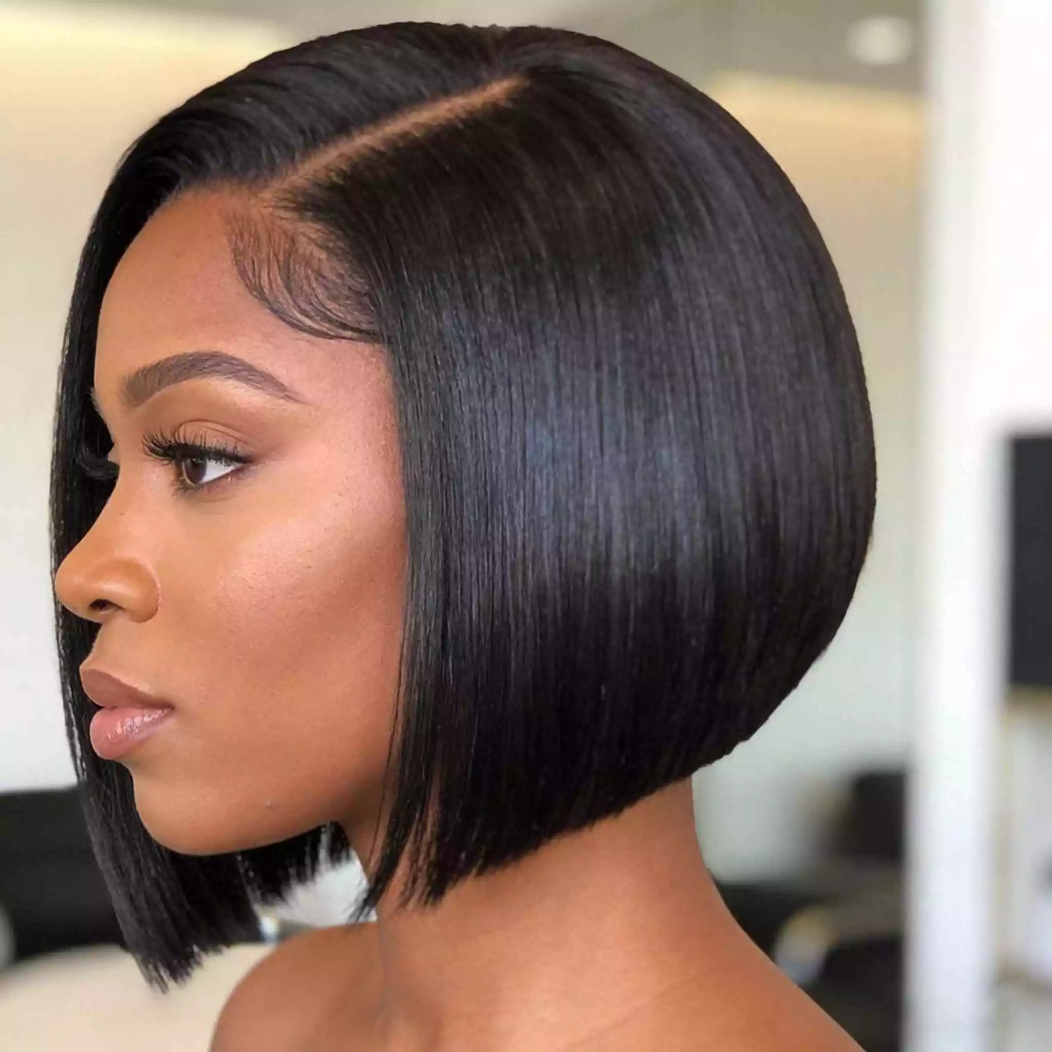 side-part polished weave for black women with sleek finish, soft framing, and controlled side part