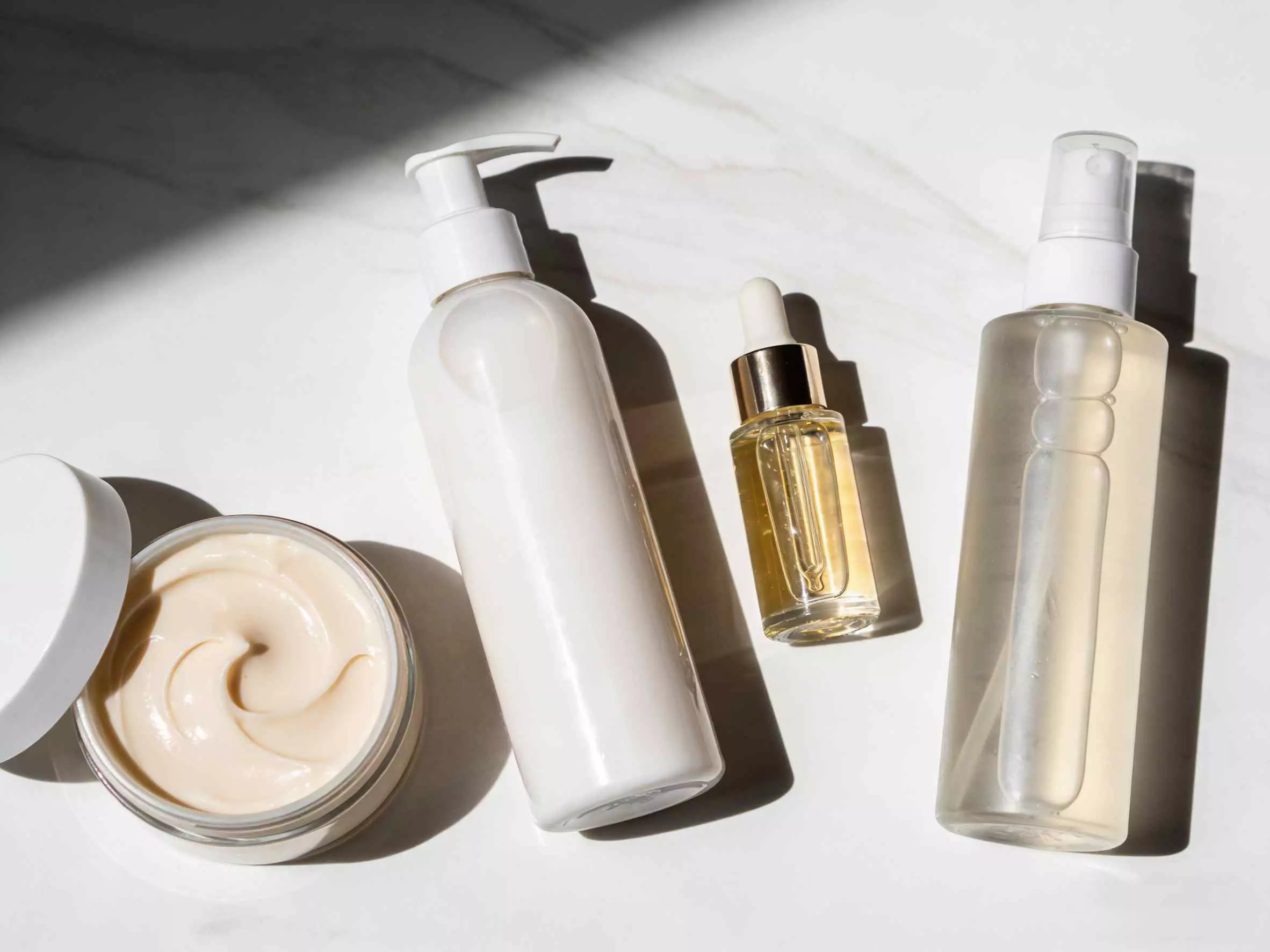 Anti-frizz long hair care essentials: leave-in, mask, serum, heat protectant