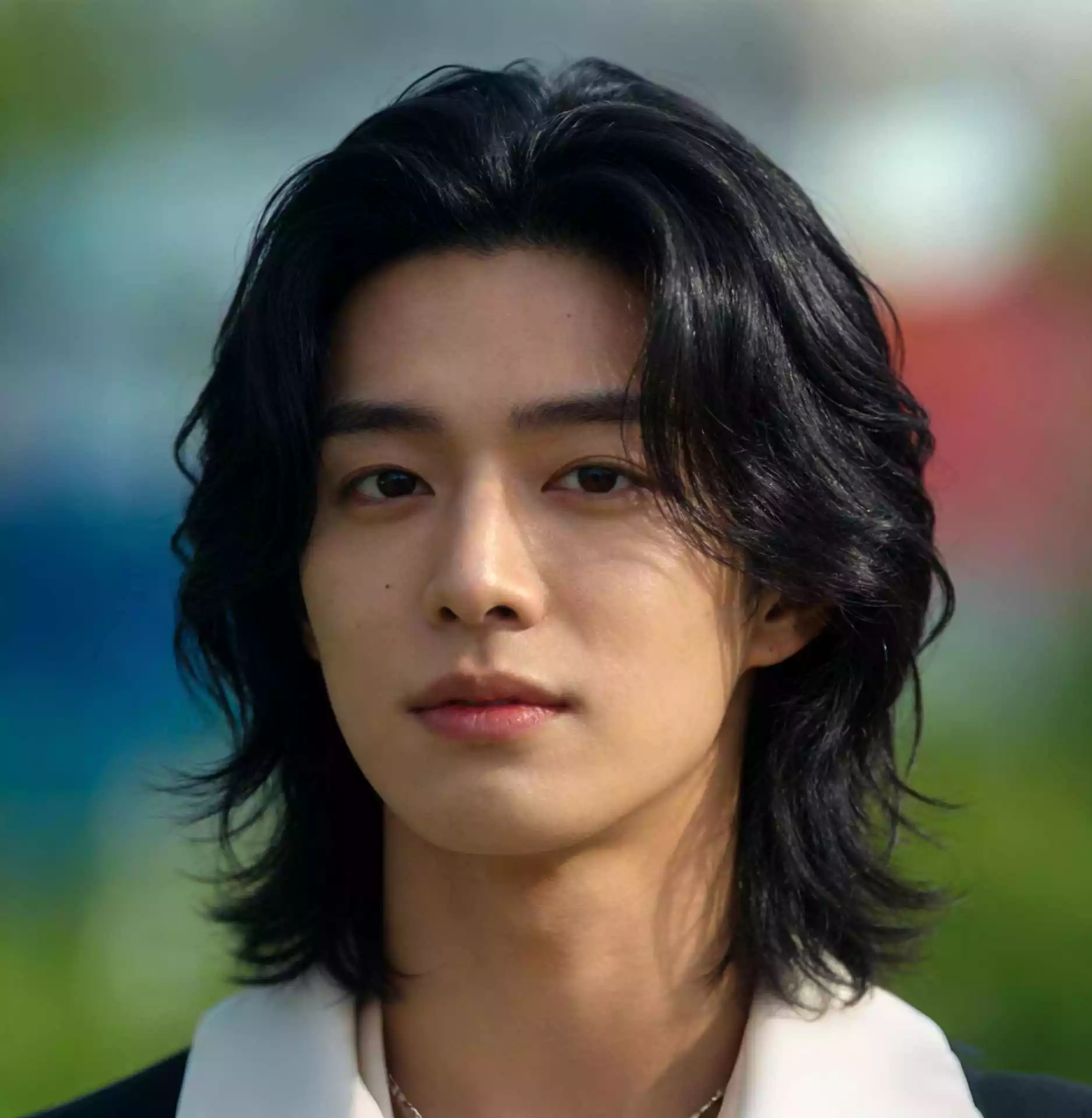 Asian men soft layered long hair — Korean-inspired medium-long style with center part, 2026