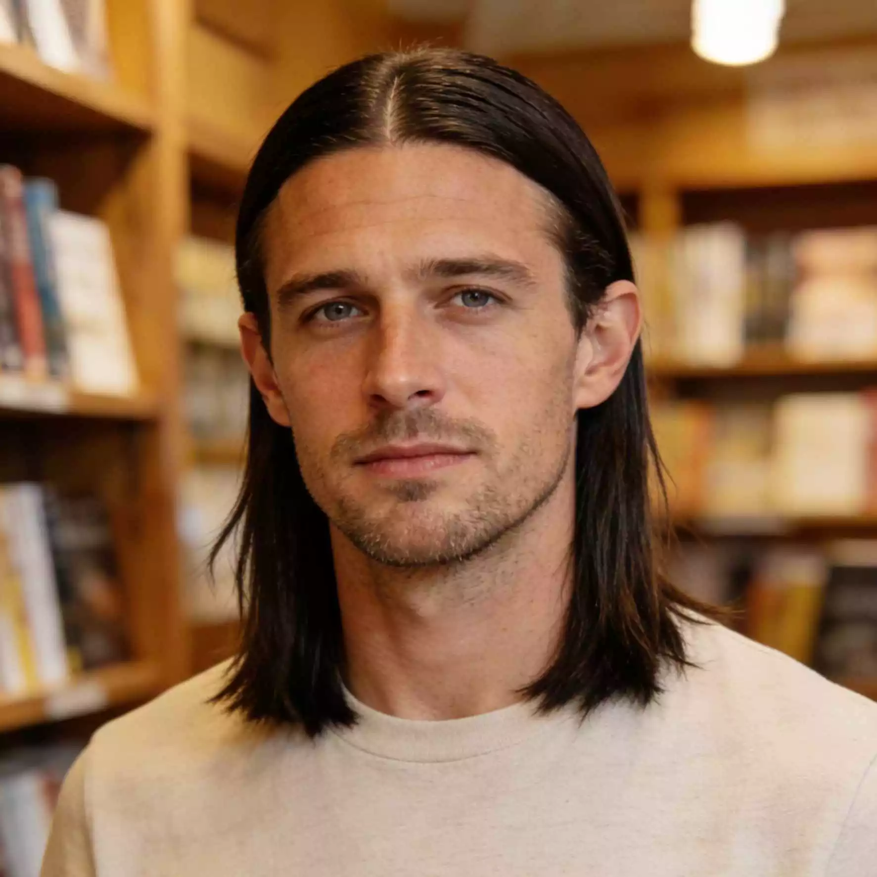 middle part long straight hair men — grow-out middle part with early collar-length straight shape