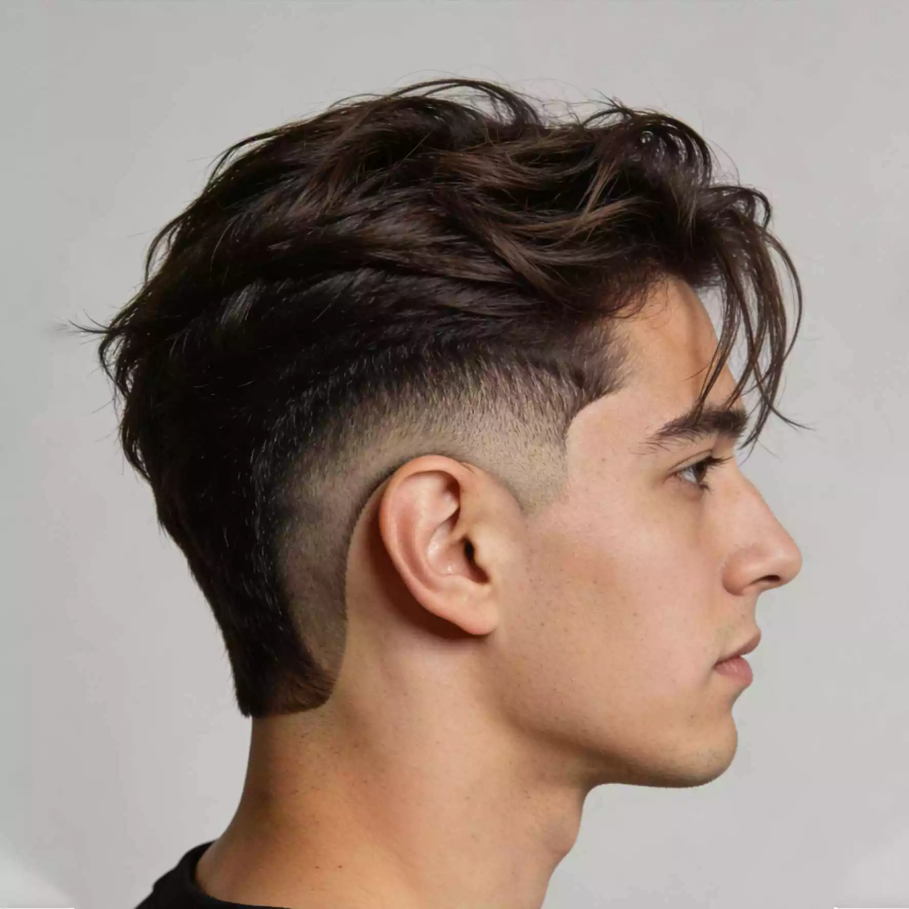 Burst fade with long top — sporty top long sides short haircut for men, 2026