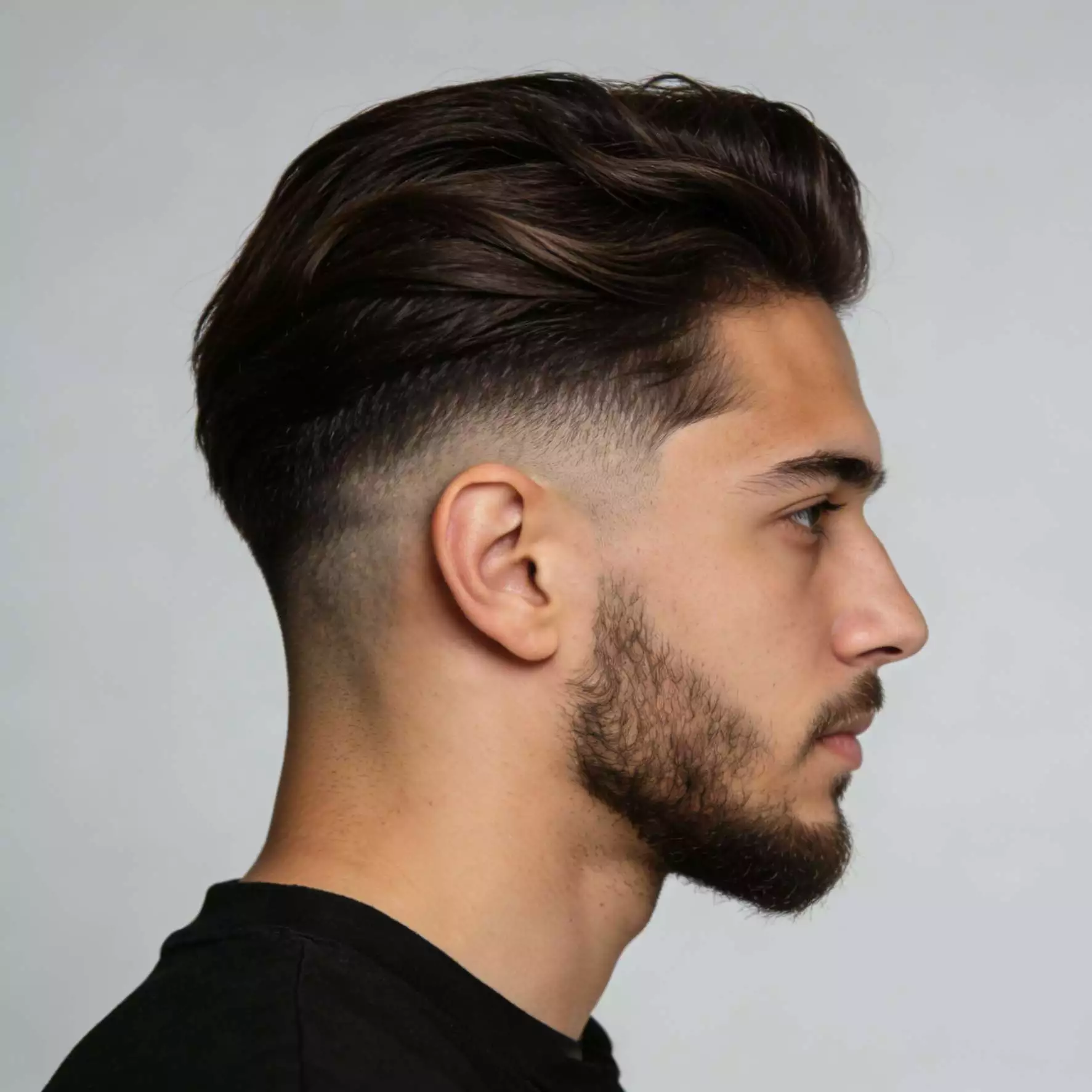 Long top with mid fade — top long sides short haircut with sharp contrast for men, 2026