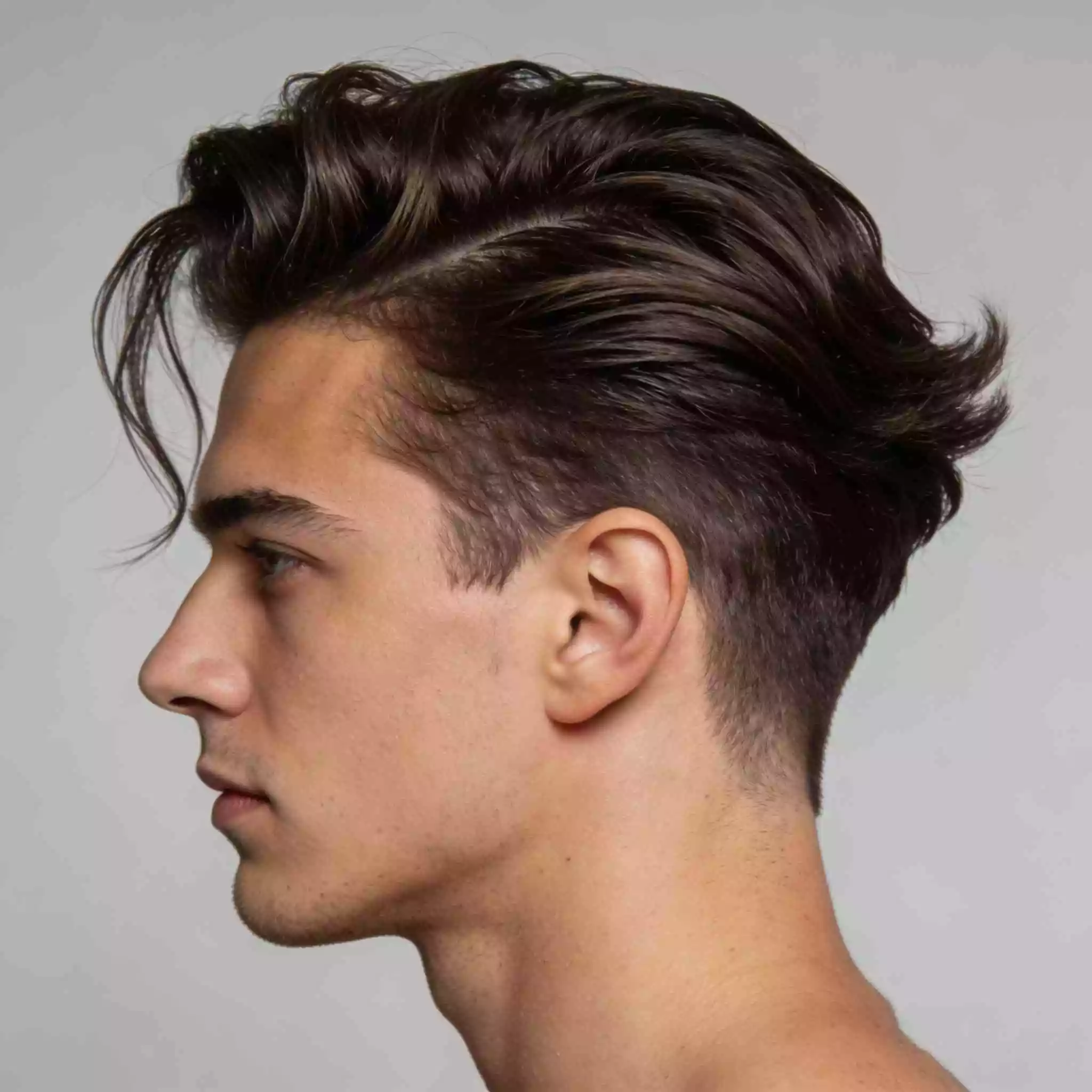 Top long sides short haircut — long textured top with low taper sides (2026)
