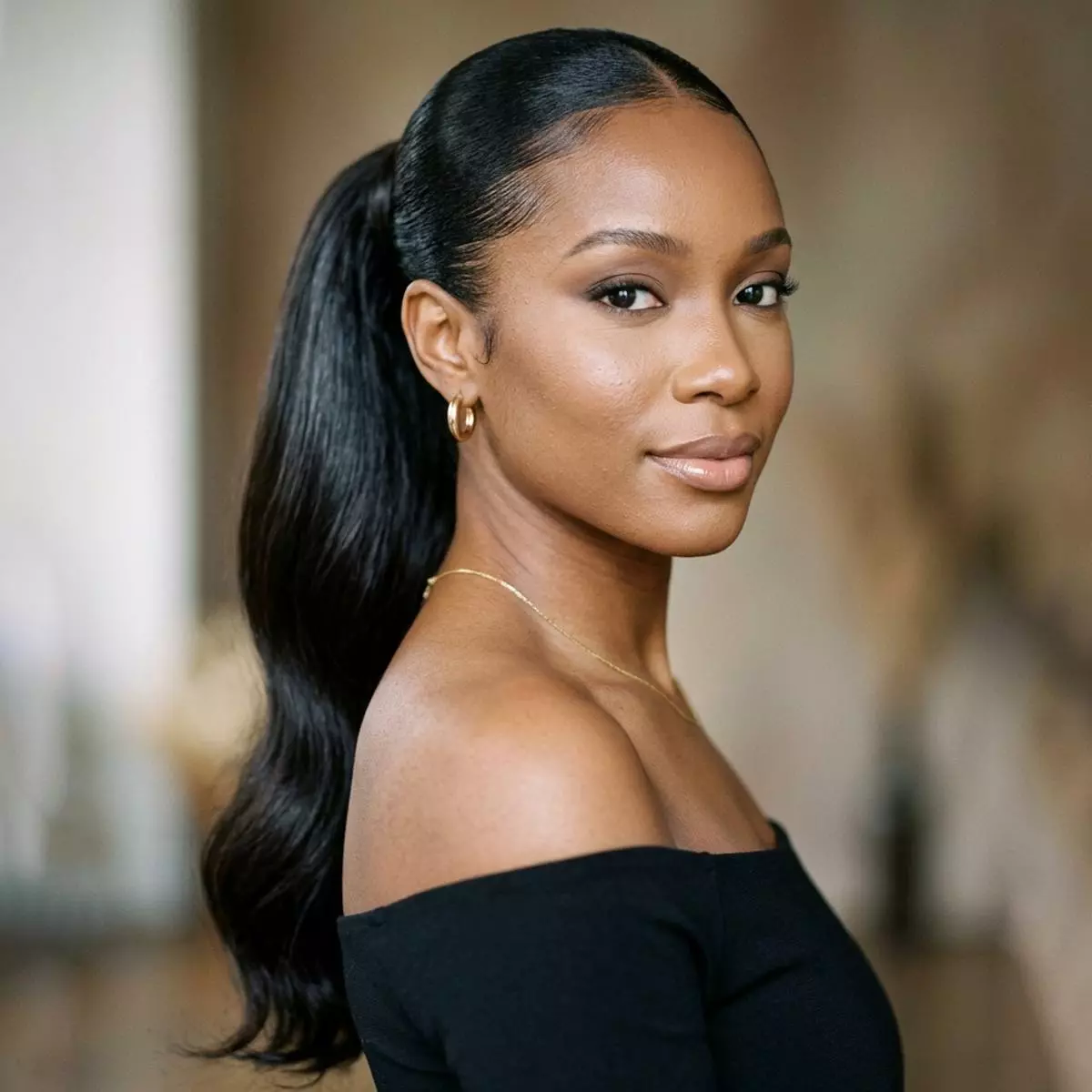 weave ponytail hairstyle for black women with added length, smooth base, fuller tail shape, and polished extension finish